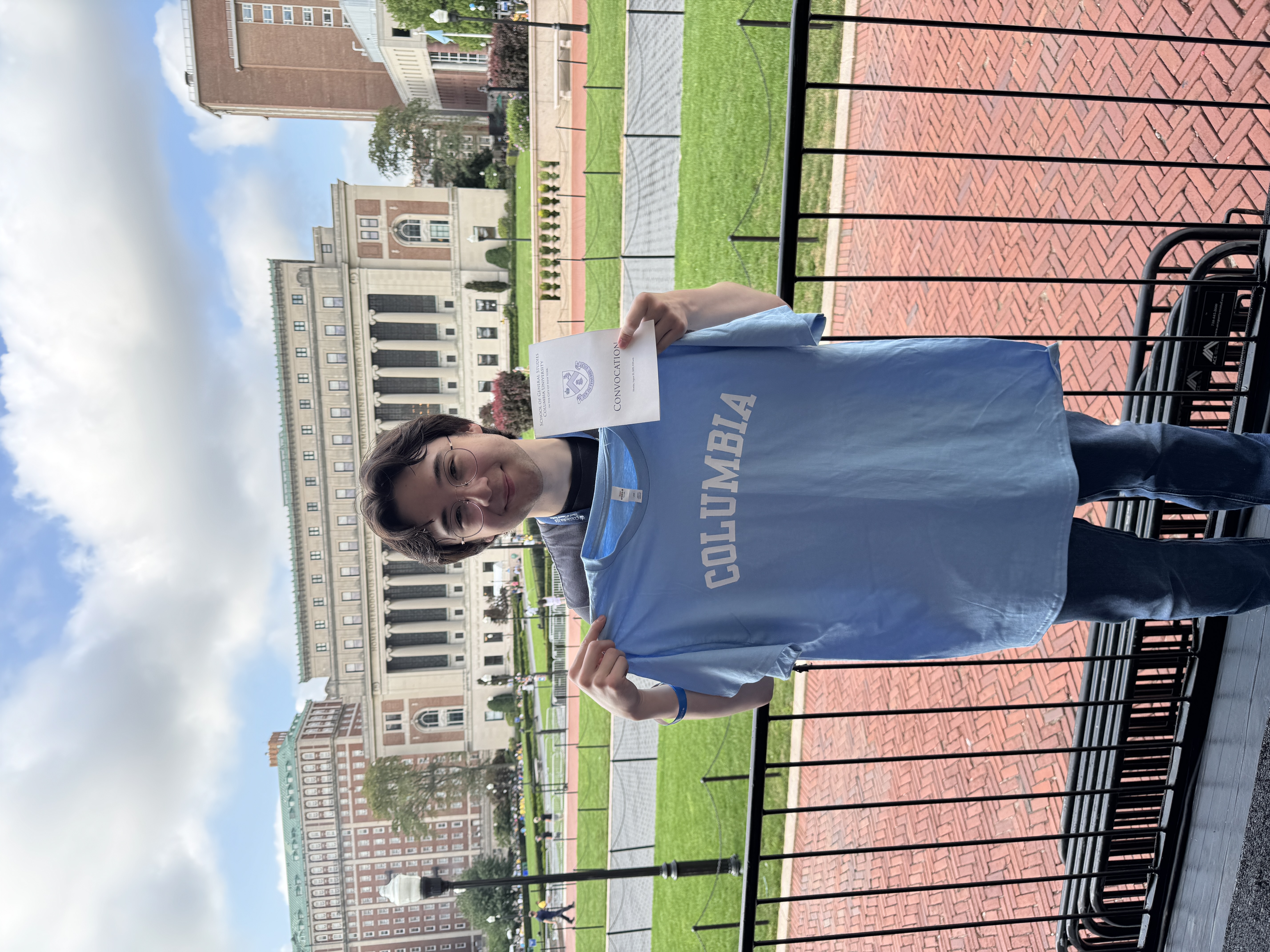 Holding a Columbia acceptance letter on campus